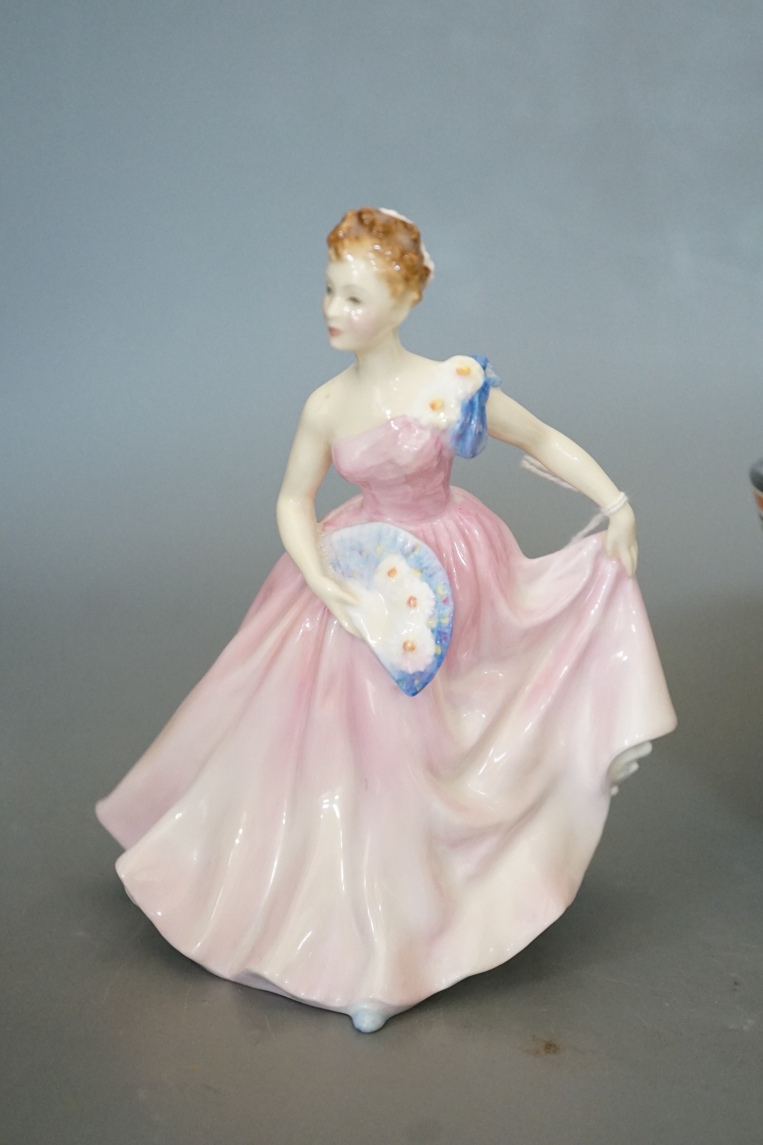 A Clarice Cliff bowl, 22cm and Doulton figure 'Invitation'